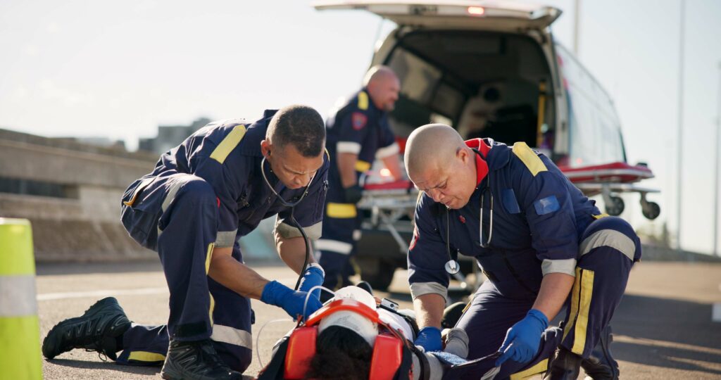 emergency and ambulance on road from car crash accident with healthcare